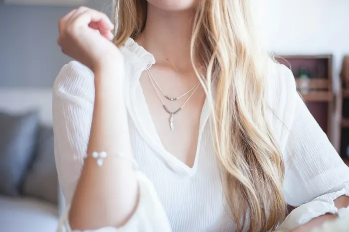 Long, glossy blonde hair moving in the breeze